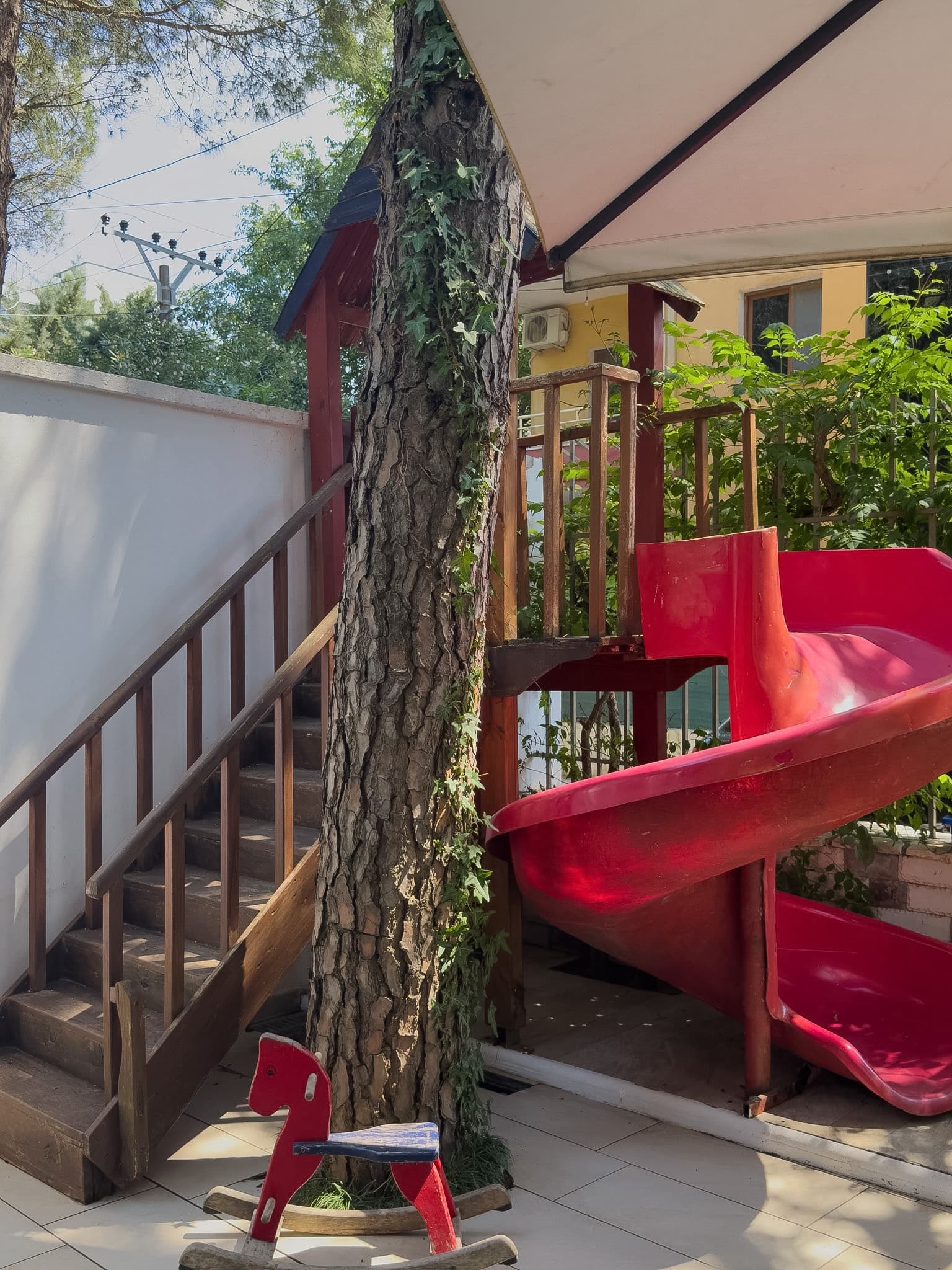 Children's play area tucked into the hotel garden
